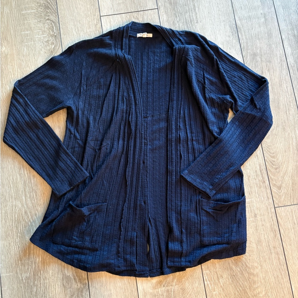 Maurice’s navy blue cardigan